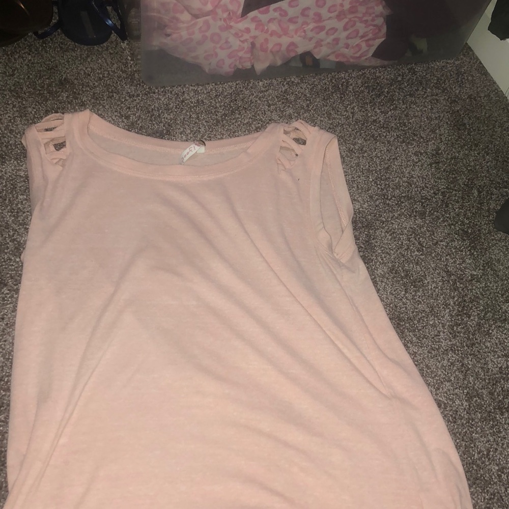 A pink shirt.